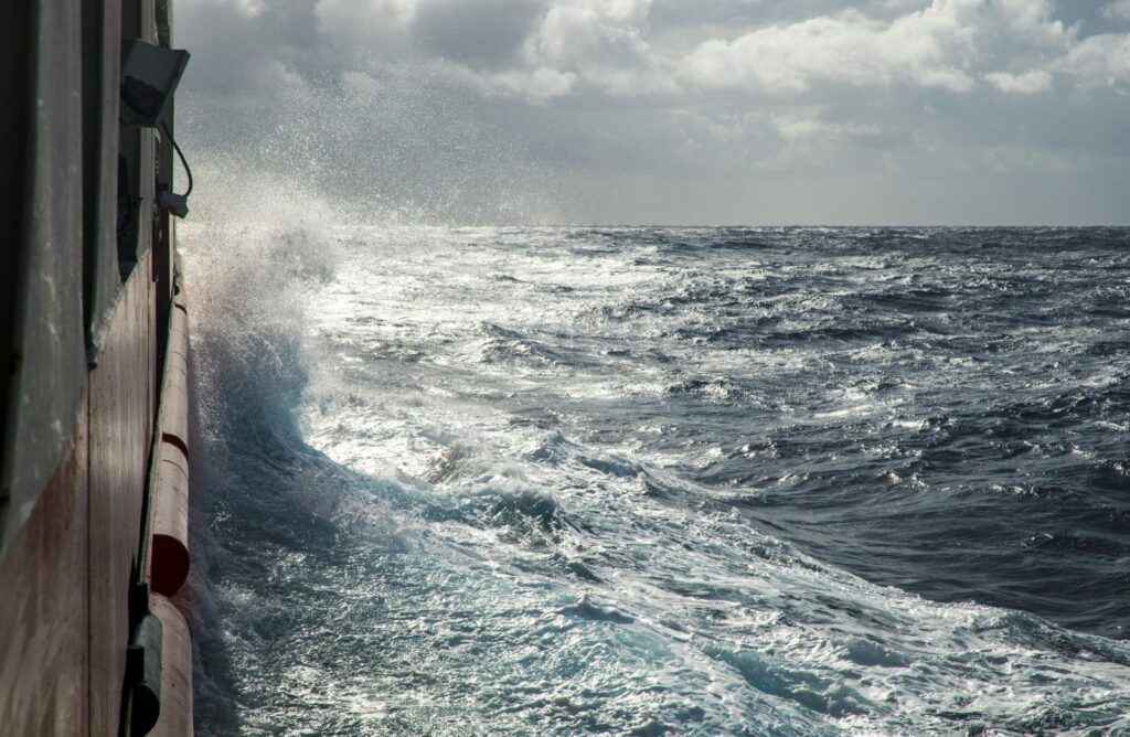 Wave crashing on starboard